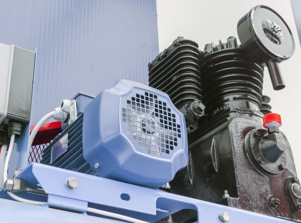 Electric Motor and Compressor Unit Mounted on Industrial Machinery — Max Fox Electrical in Taminda, NSW