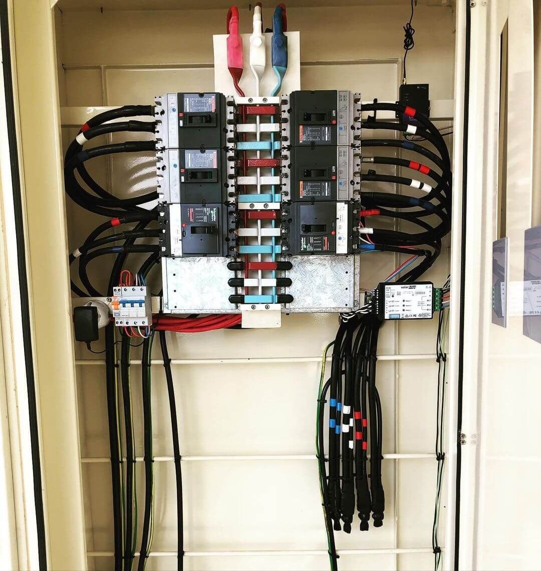 A Very Large Electrical Box with A Lot of Wires Connected Inside It — Max Fox Electrical in Taminda, NSW