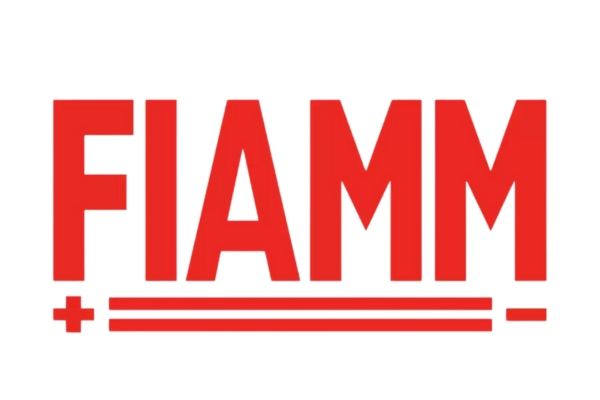 The red FIAMM logo featuring a plus sign, two horizontal lines, and a minus sign underneath.