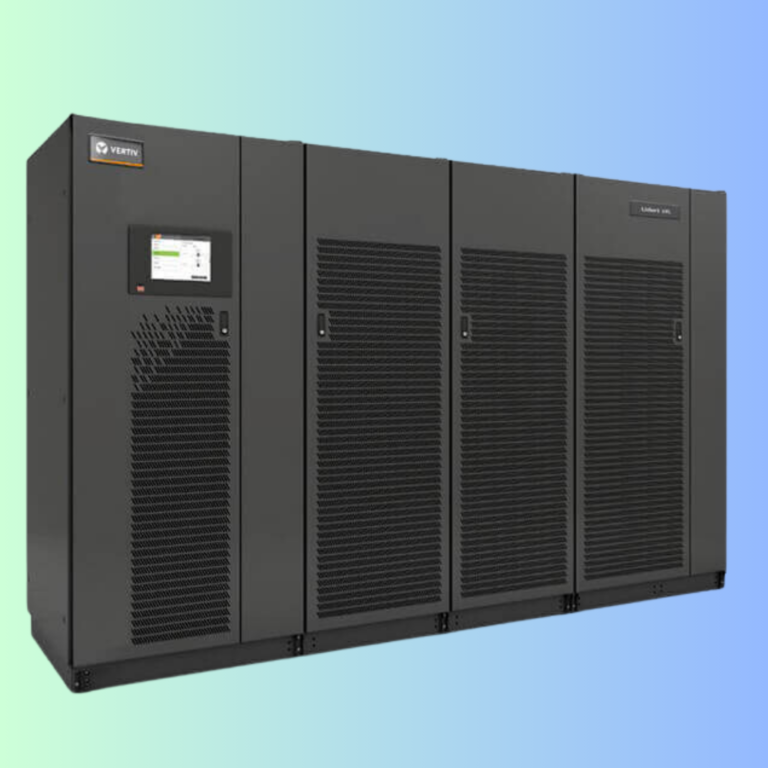 A gray, industrial-style modular data center UPS unit with a digital display screen on the front panel.