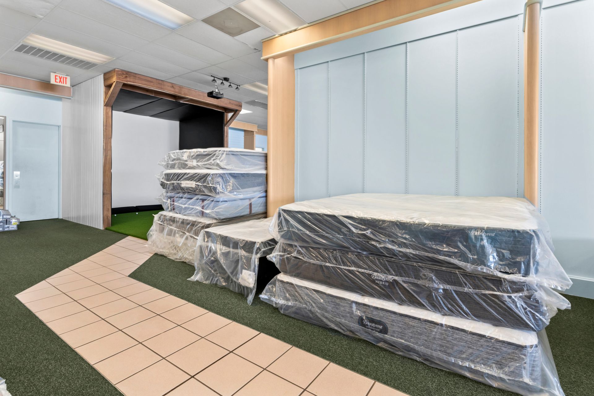 A store filled with lots of beds and mattresses