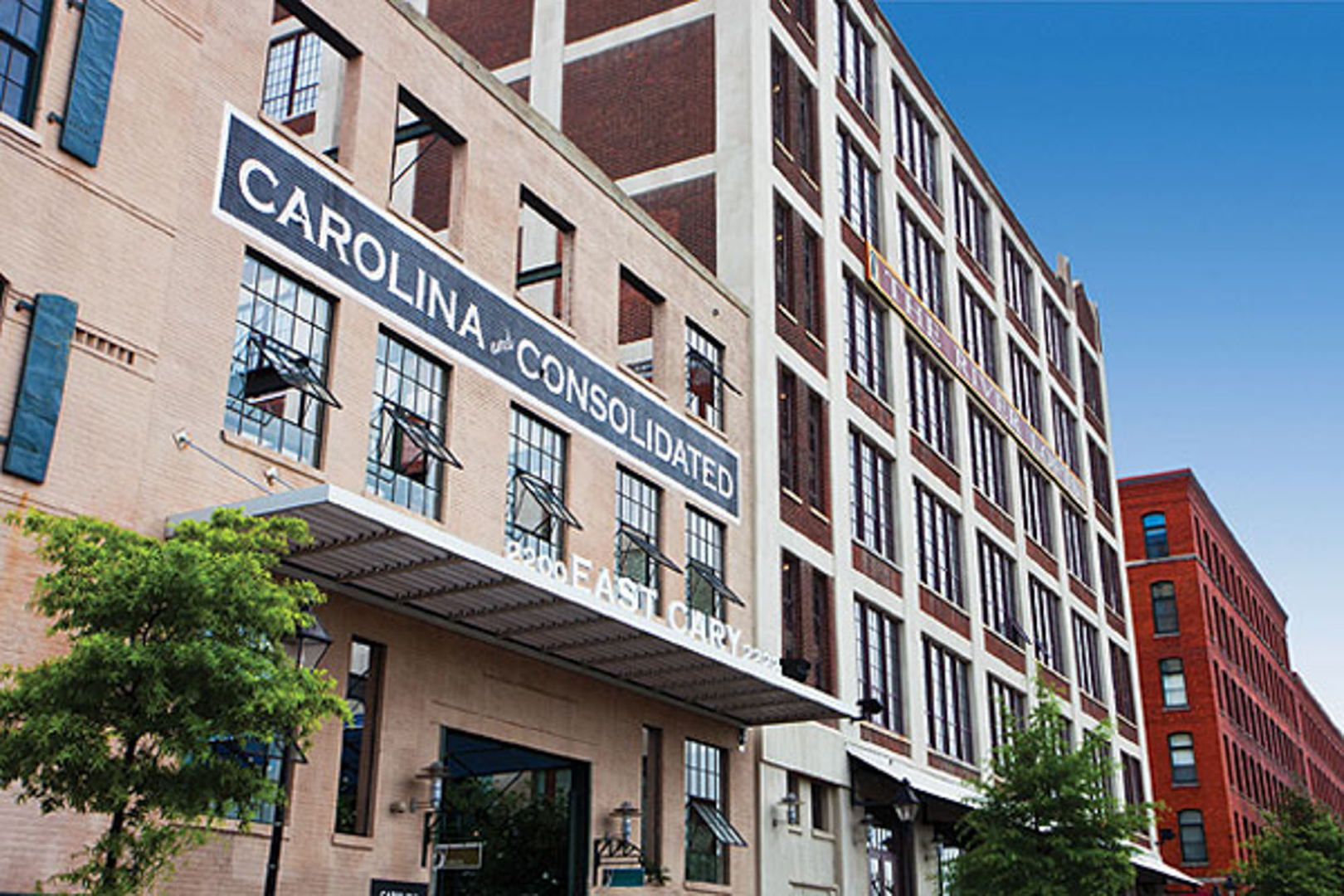 A large building with a sign that says carolina consolidated.
