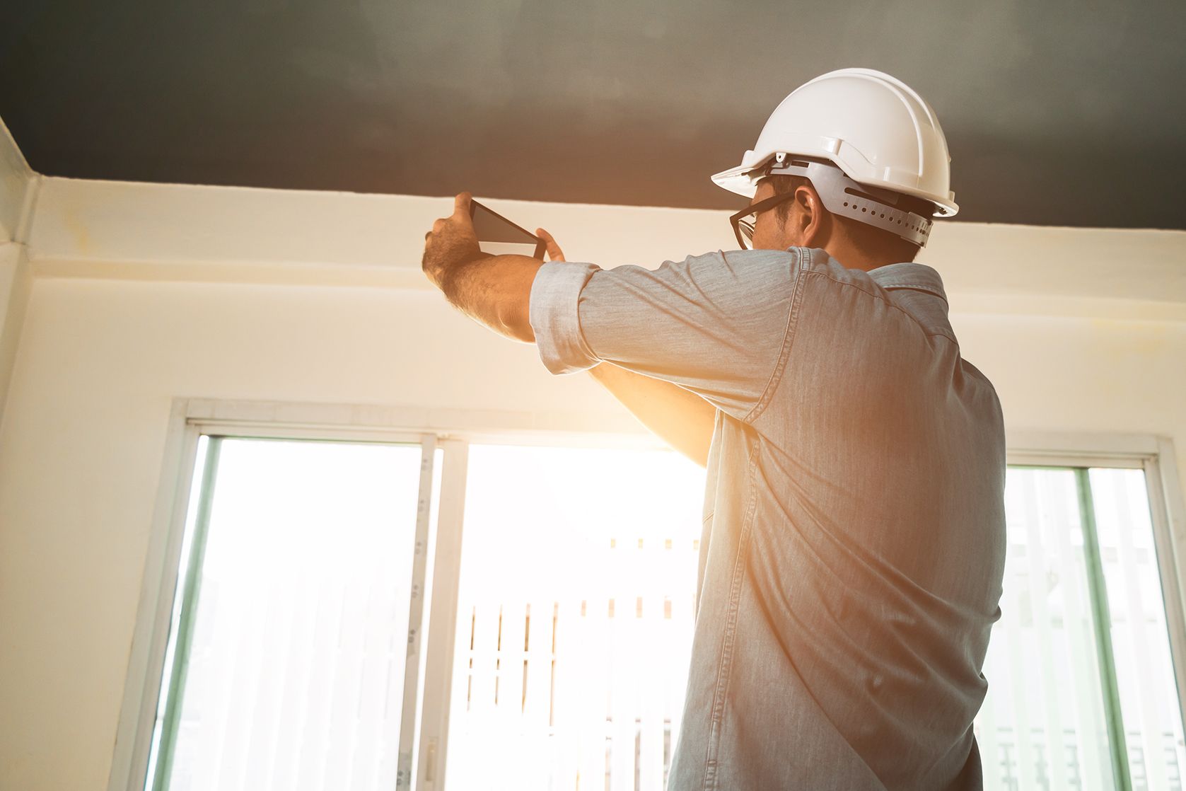 engineers inspect house use phone take