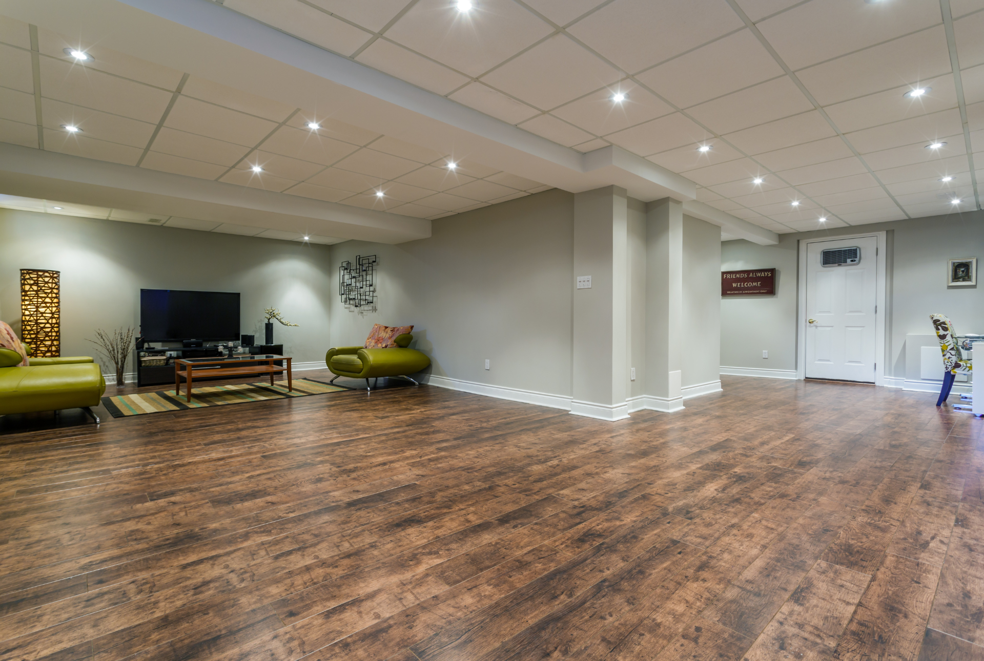 hardwood flooring in a basement living space