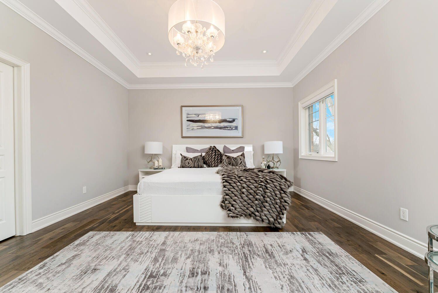 There is a large bed in the middle of the room.