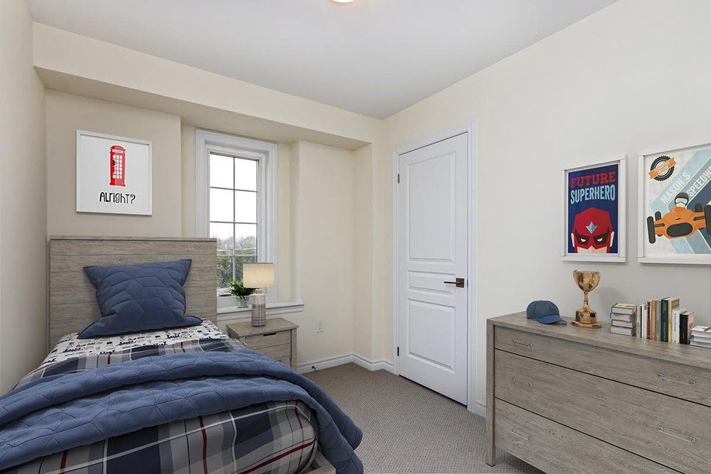 A bedroom with a single bed and a dresser.