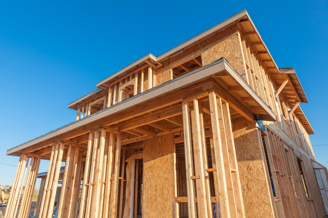 house under construction at the framing stage.