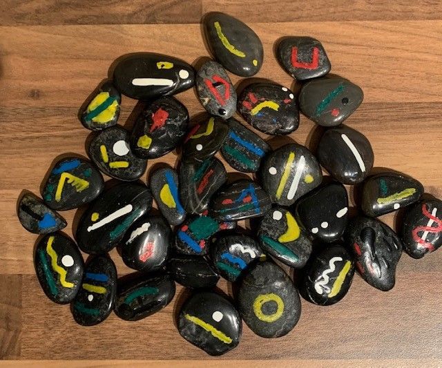 original hand painted rune stone symbols used in spiritual guidance