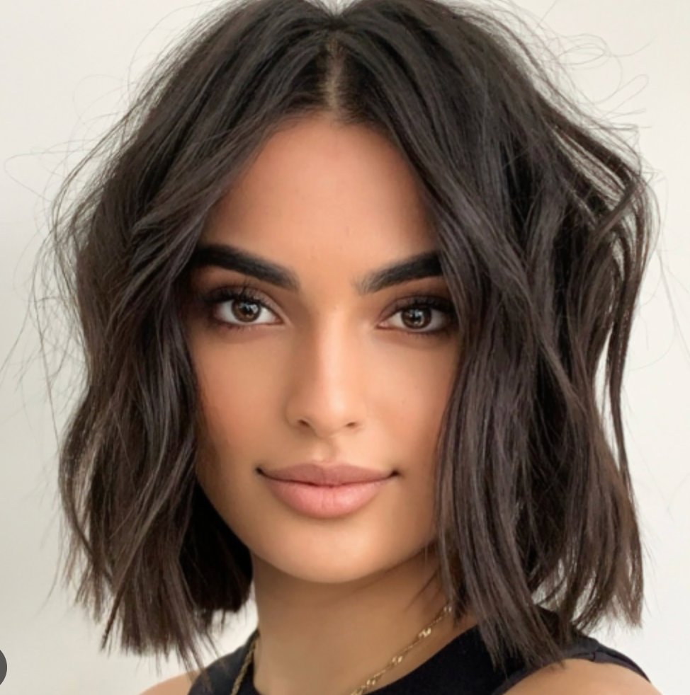 Woman with rich dark brunette hair color at Limelight Salon