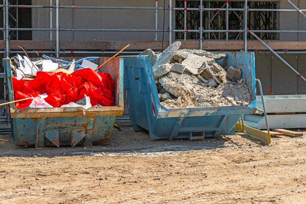 Dumpsters On Construction Site — Clinton, MO — Golden Valley Disposal LLC