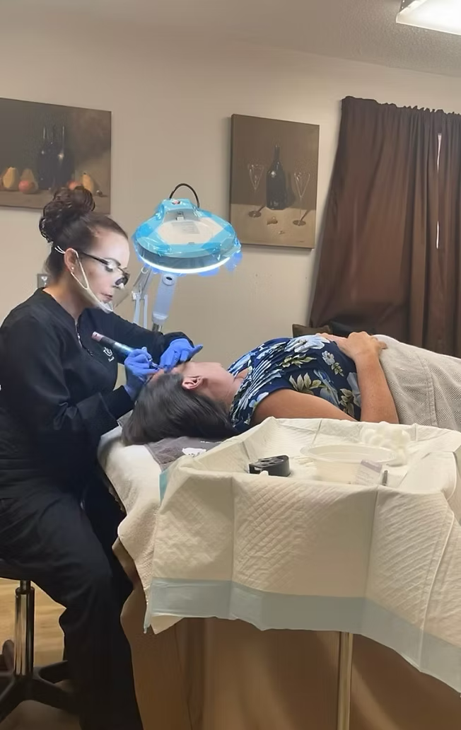 women getting permanent makeup on eyebrows