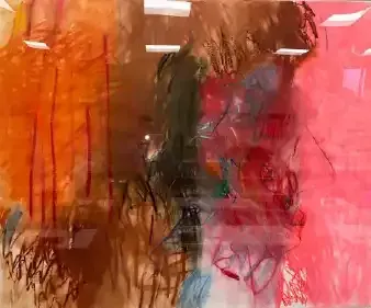 Abstract blurry figure with orange, pink, and dark vertical brushstrokes on a bright background