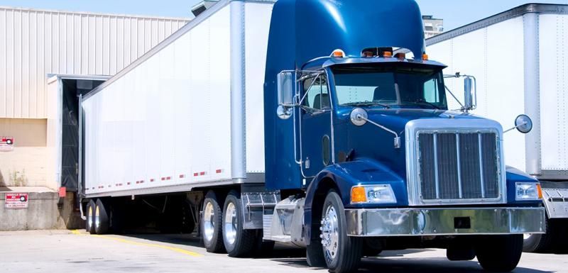 blue and white semi truck