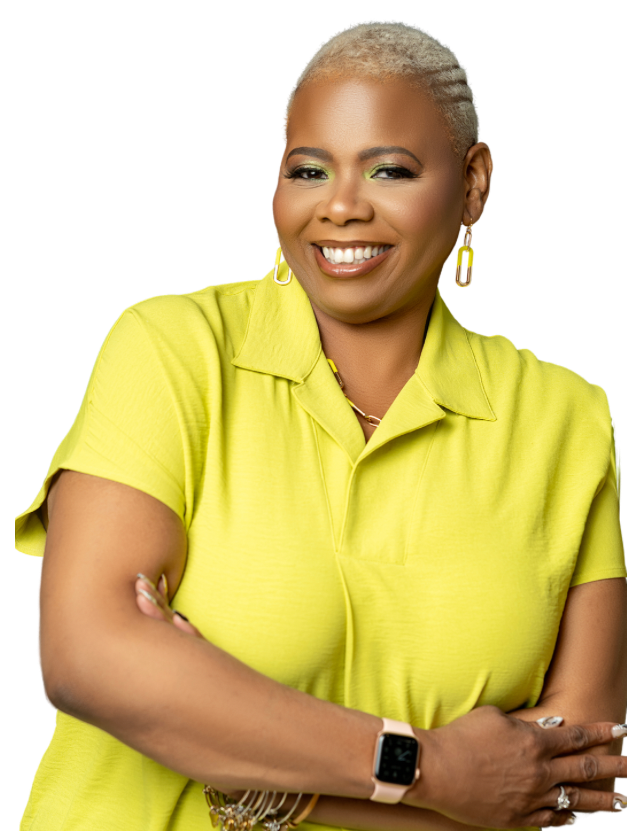 Photo of Patricia A. Winfield wearing citron short sleeve blouse smiling while leaning on a wall 