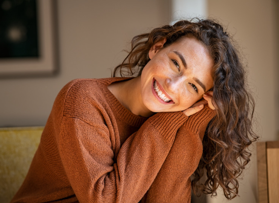 woman smiling | cosmetic dentist in Oelwein IA | Whitening, and Veneers