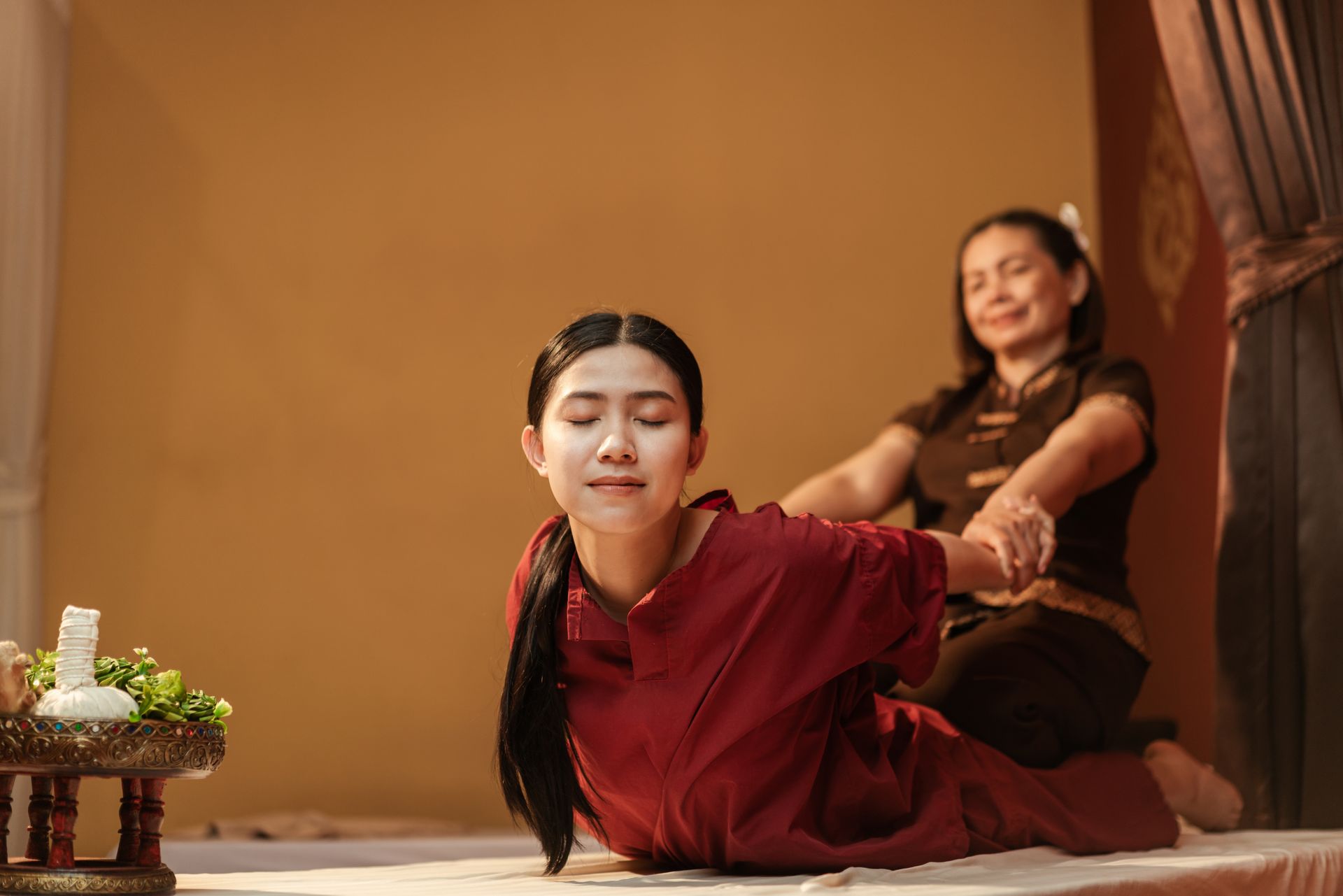 A woman is getting a massage at a spa.