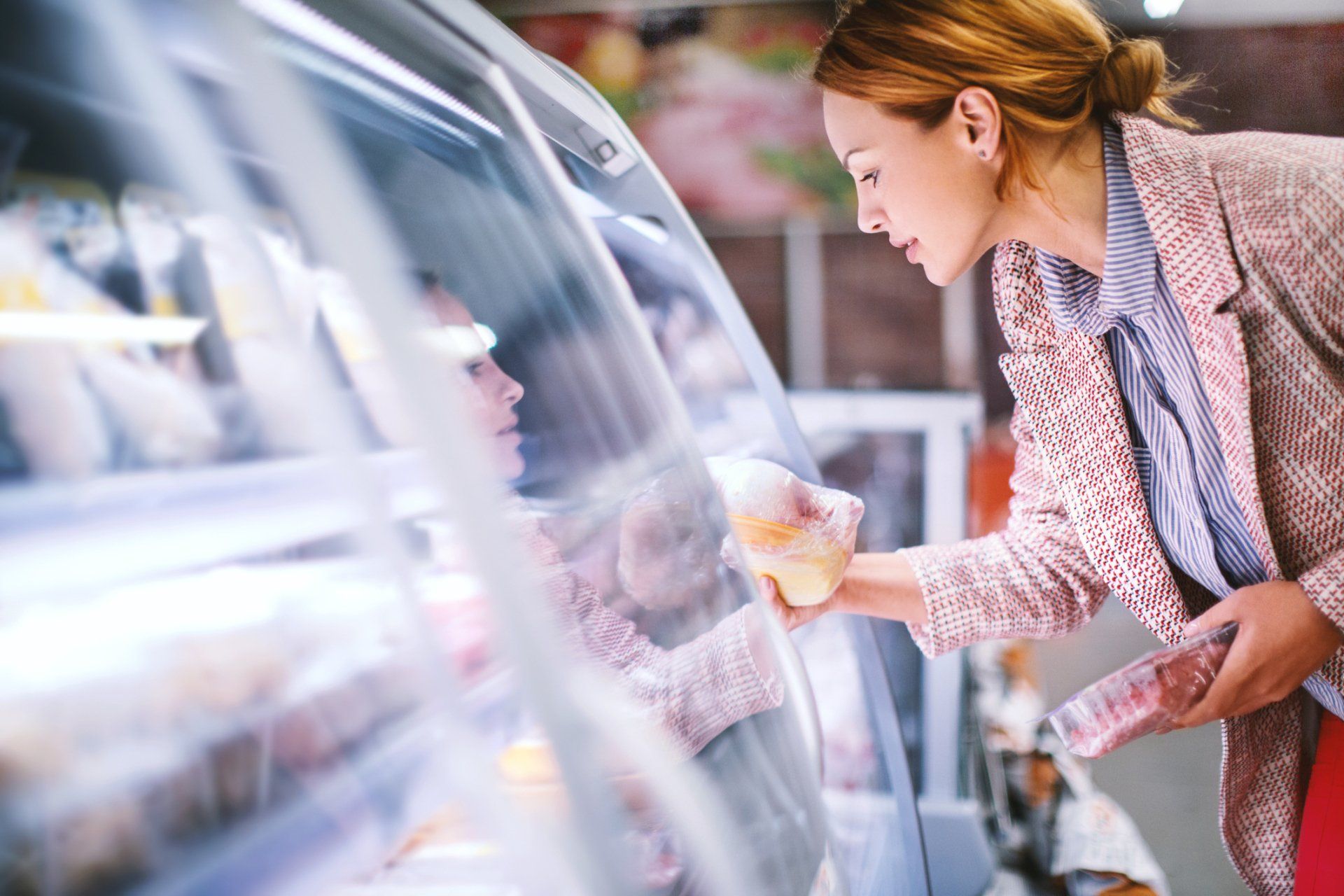 Woman Buying A Meat — Huntingburg, IN — RG Mechanical Contracting LLC