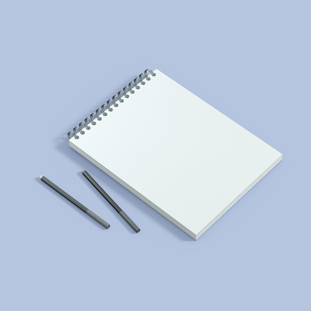 A spiral notebook with two pens on a blue background.
