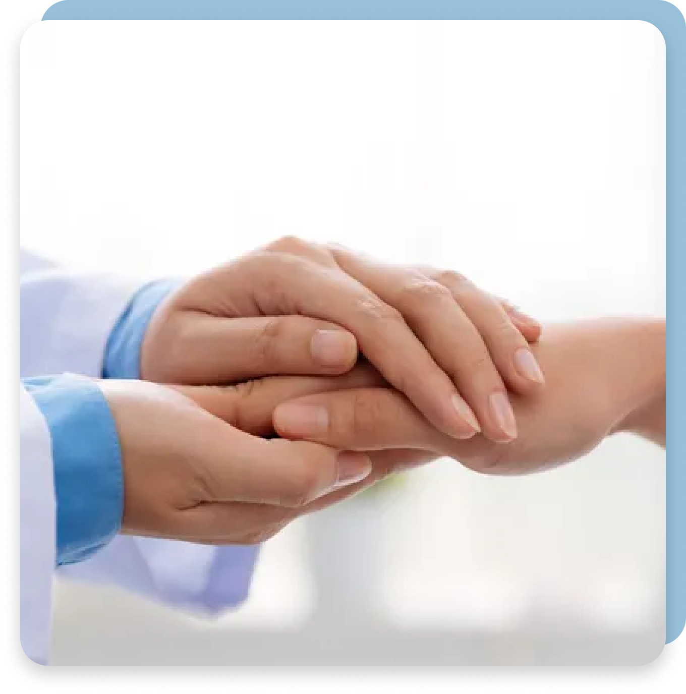 A doctor is holding the hand of a patient.