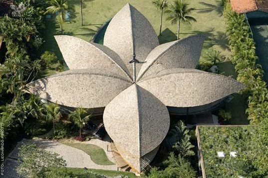 An aerial view of a building that looks like a flower