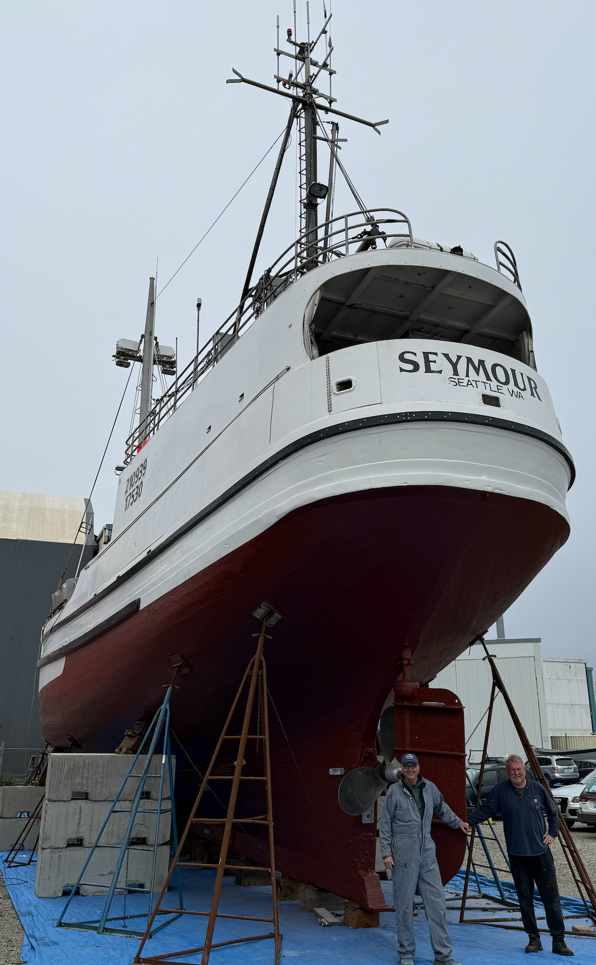 Owner John McHenry and captain Pete Lopuszynski beside Seymour's rudder at Port Townsend Shipwrights.