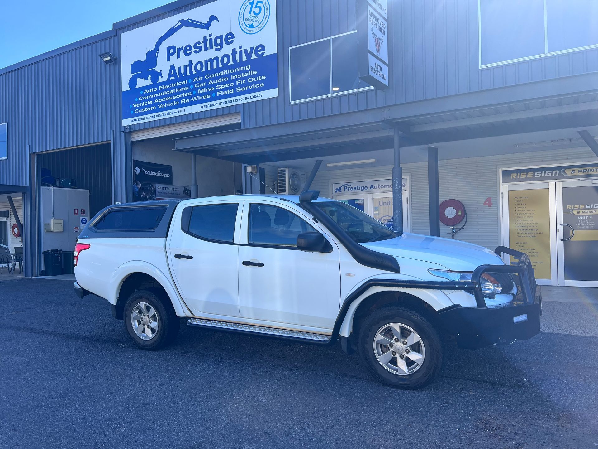 White Pickup Truck Parked Outside — Prestige Automotive NT In Adelaide River, NT