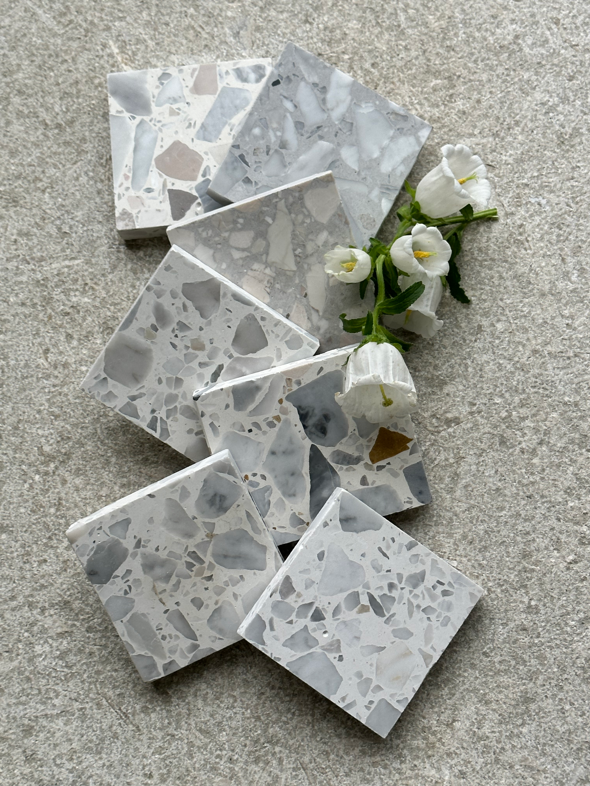 Pile of Square, Light Gray Terrazzo Coasters — Stone Arc in Kincumber, NSW