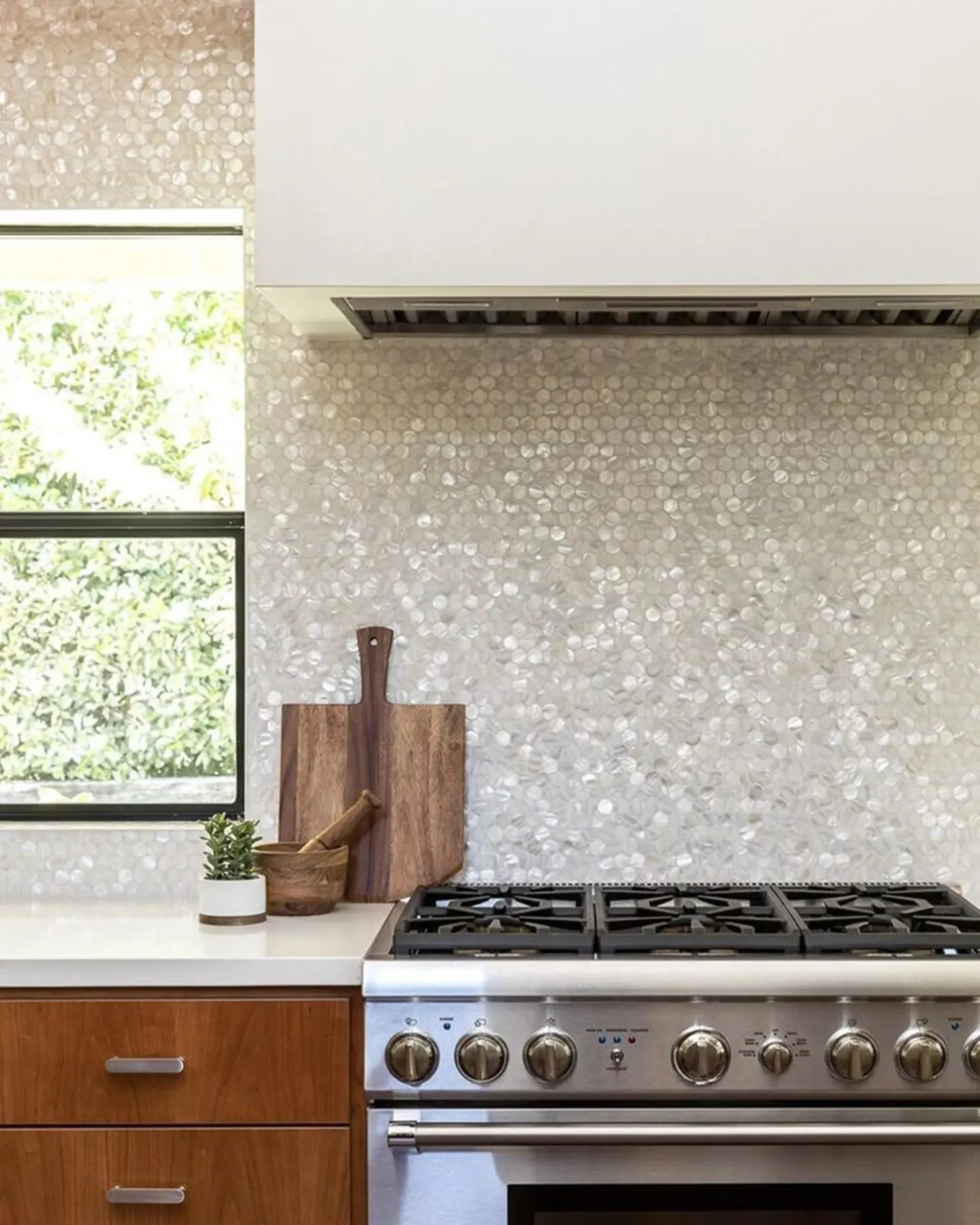 Kitchen With Stainless Steel Stove — Stone Arc in Kincumber, NSW