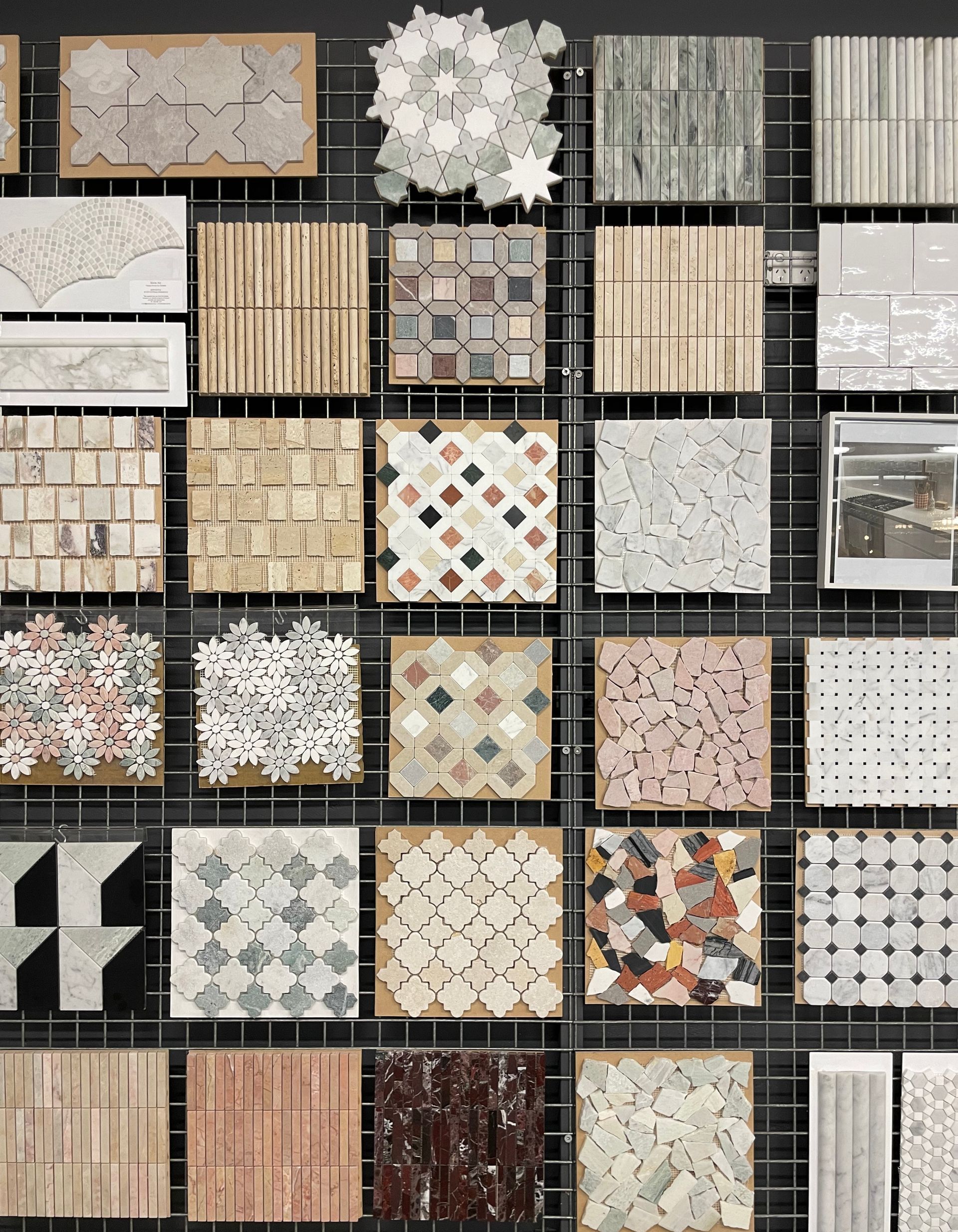 A Variety Of Tiles Are Displayed On A Rack — Stone Arc in Kincumber, NSW