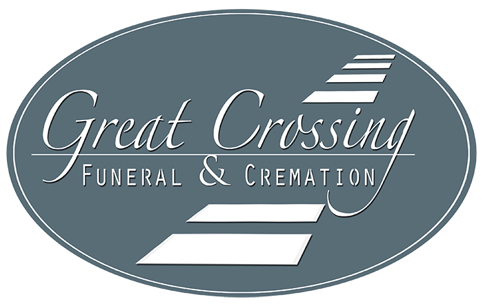 Great Crossing Funeral & Cremation logo in gray and white oval