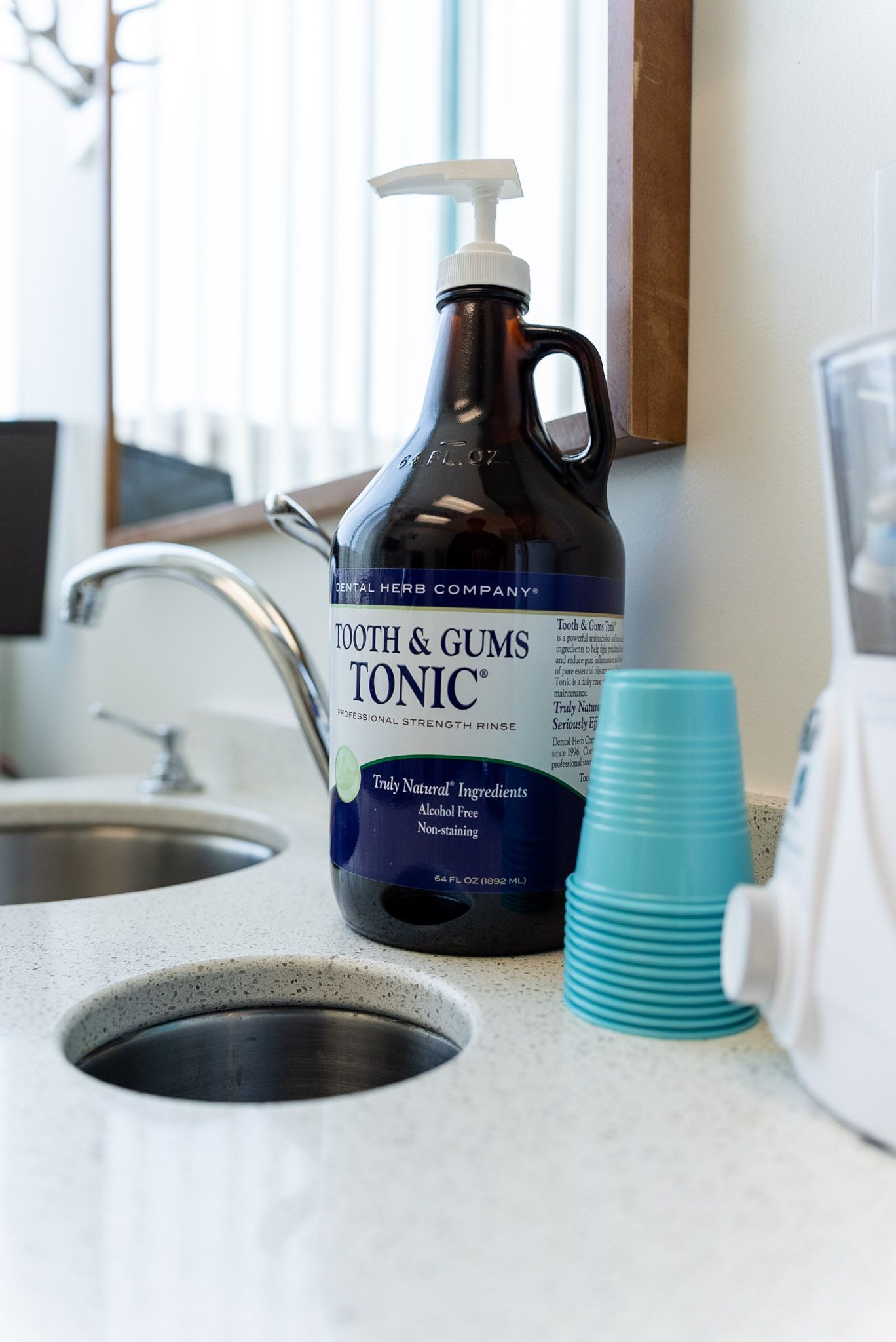 Gum health rinse by the sink in a Forever Smile treatment room