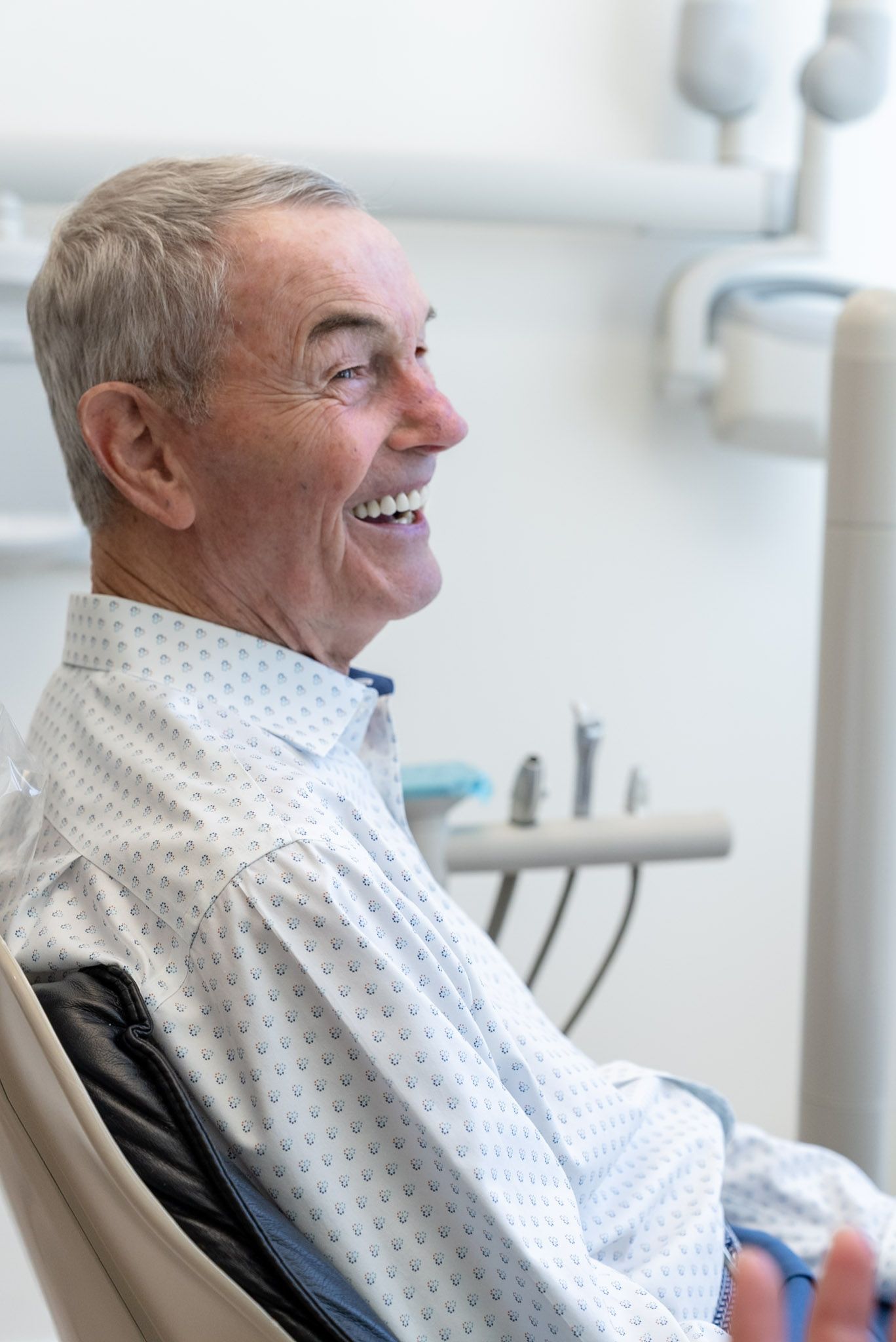 A patient laughing in the dental chair at Forever Smile, Los Angeles dentist