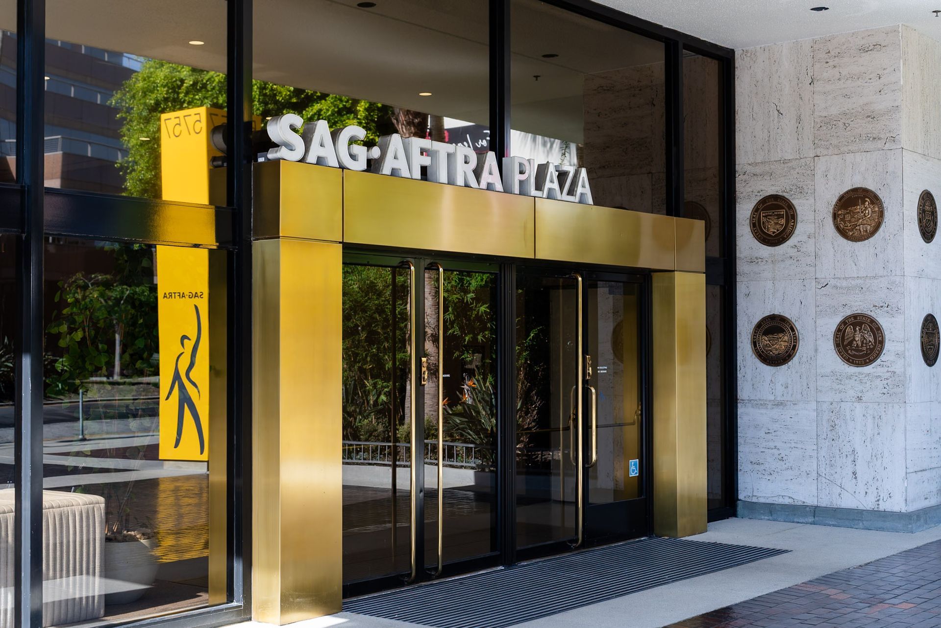 Gold entrance of SAG-AFTRA Plaza at 5757 Wilshire Blvd, home of Forever Smile