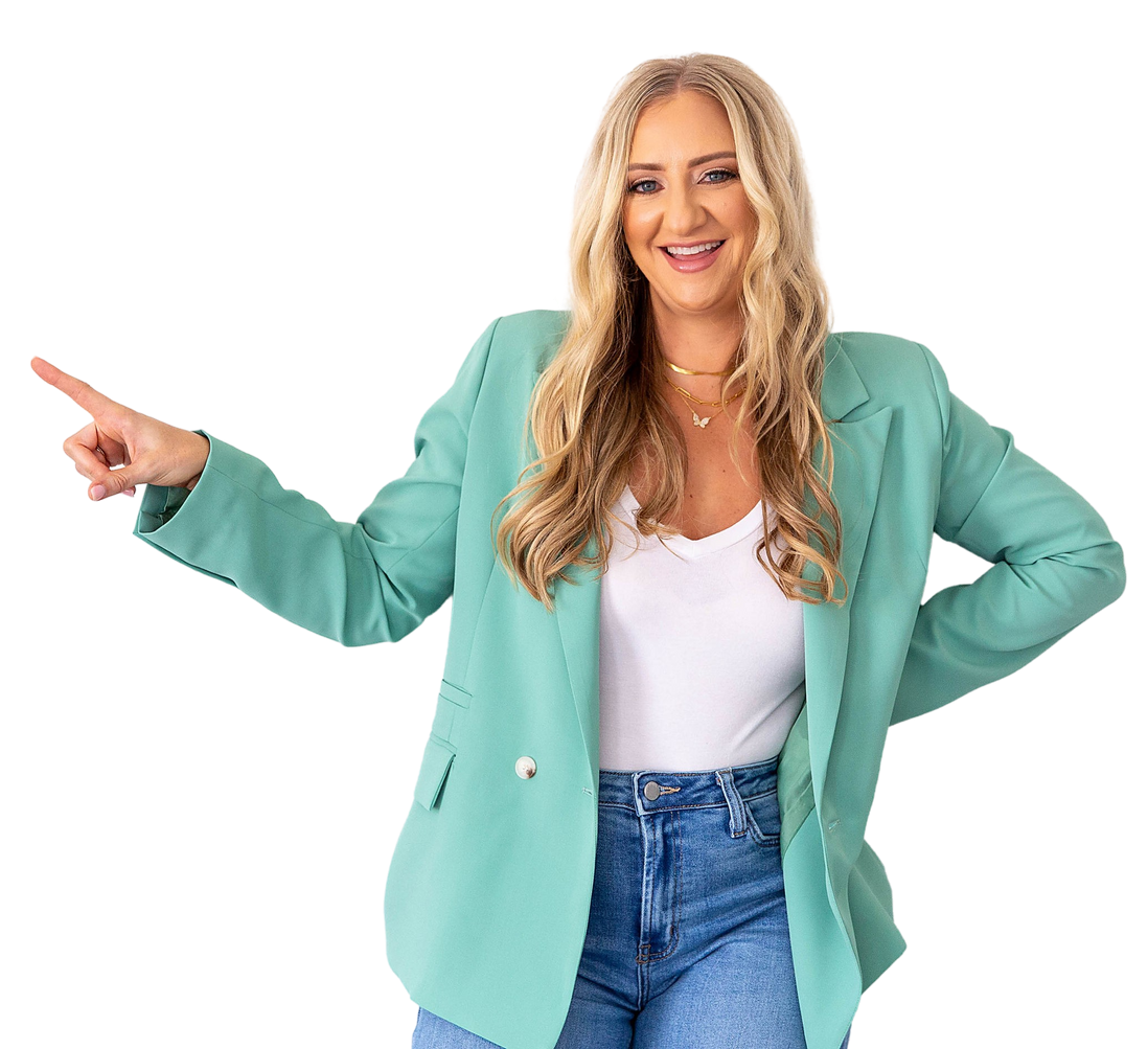 Kim Diehl Insurance Agent in a green jacket is pointing at something