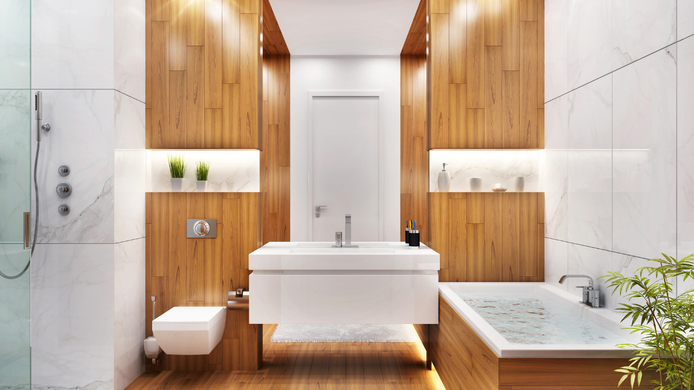 Modern bathroom with wood paneling, white sink and toilet, and a bathtub.
