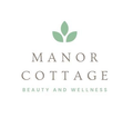 Manor Cottage Beauty and Wellness logo with green leaf icon and gray text on white background