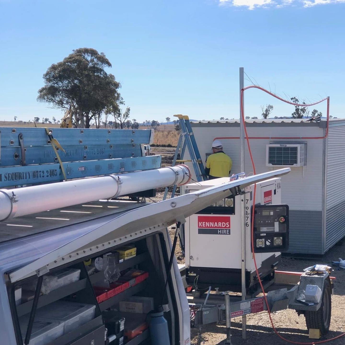 Electrician Connecting Temporary Generator Power — Electrical Contractors in Glen Innes, NSW