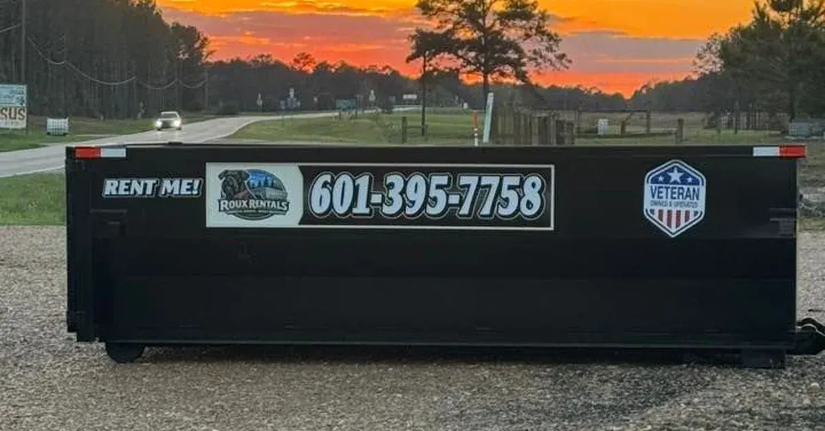 roux-rental-dumpster-with-rent-me-sign-osyka-ms