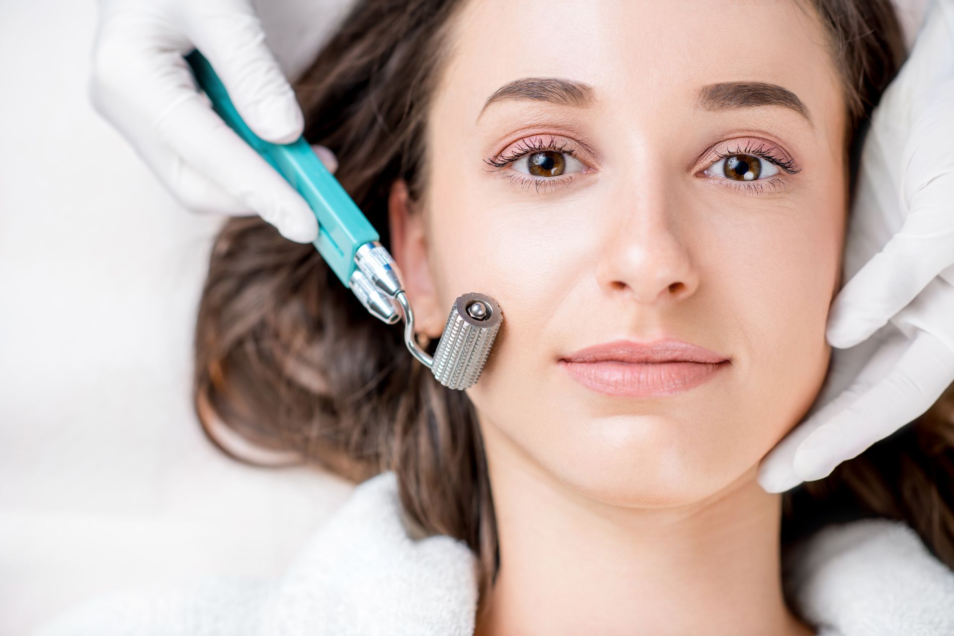 Woman Having a Micro-Needling Session