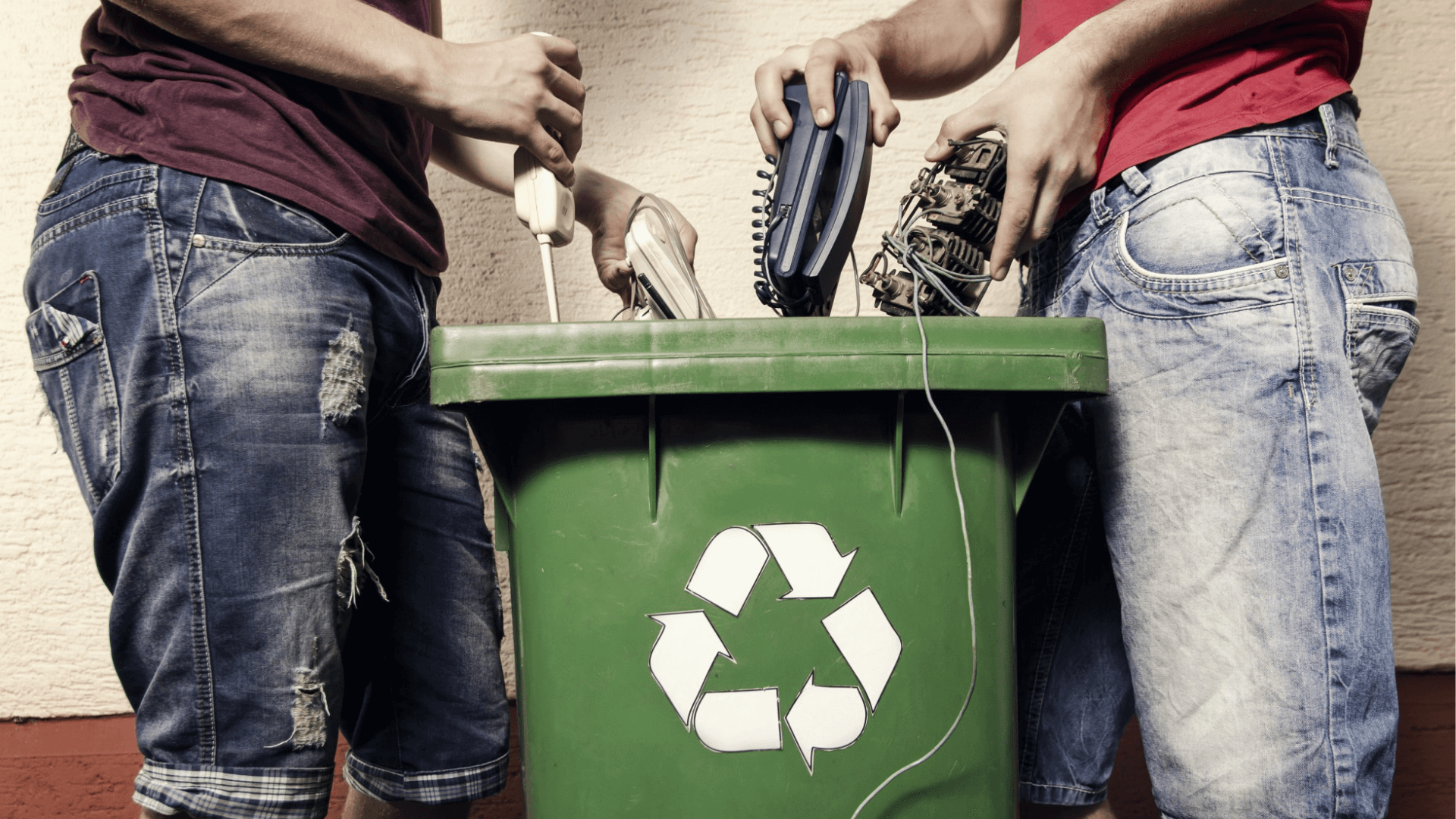 Two people wondering if what they are recycling is truly recyclable