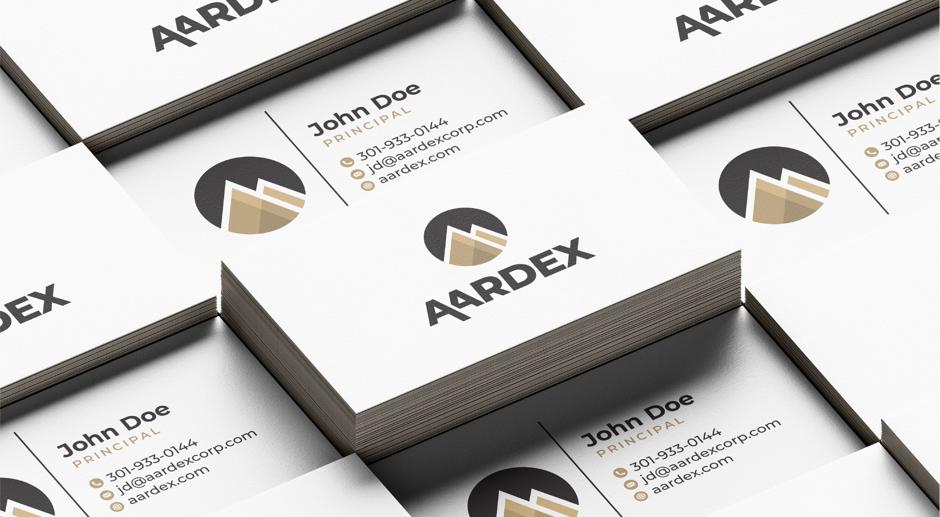 A stack of business cards sitting on top of each other on a table.