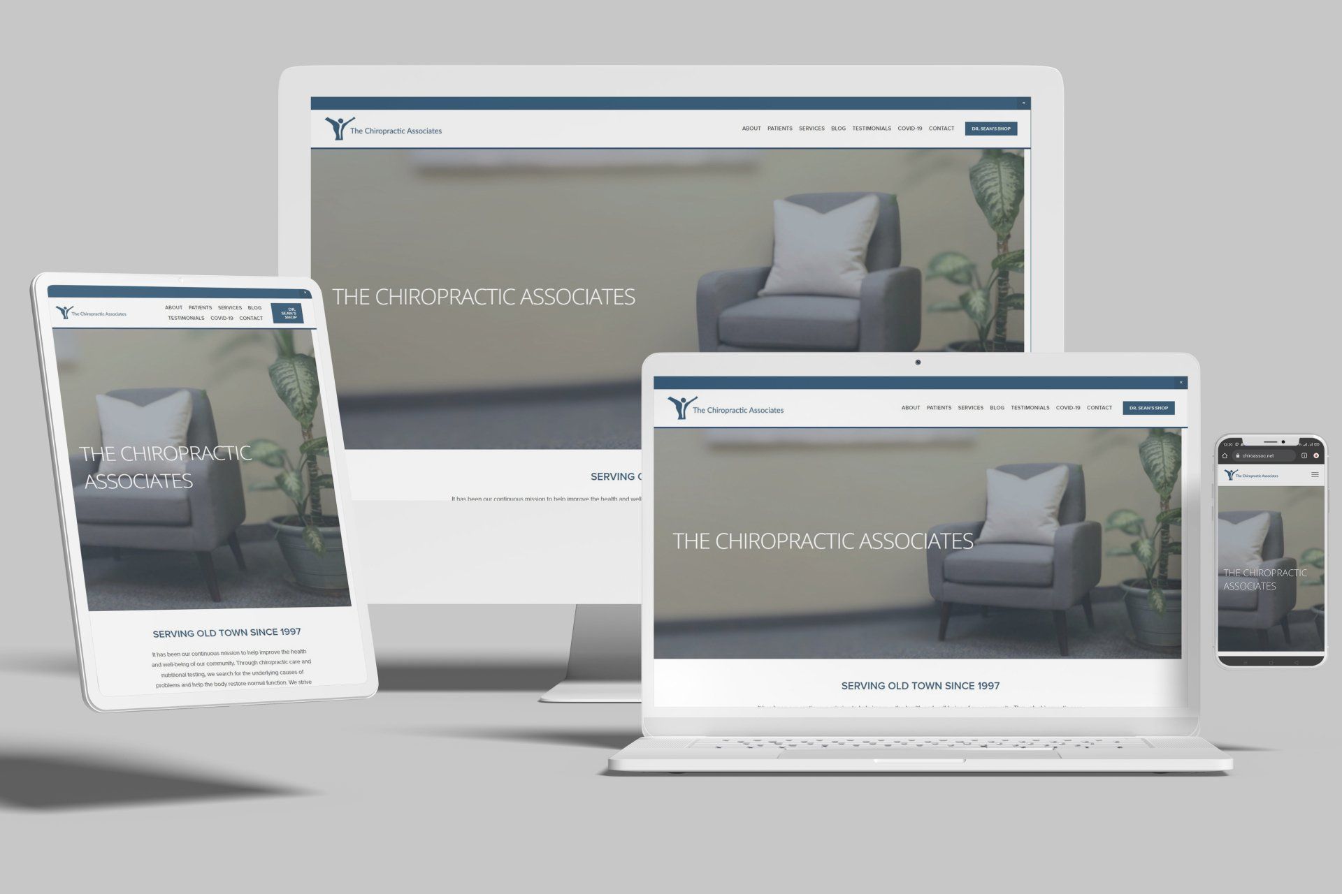 Website mockup: A website displayed on various devices, showcasing a modern interior with an armchair.