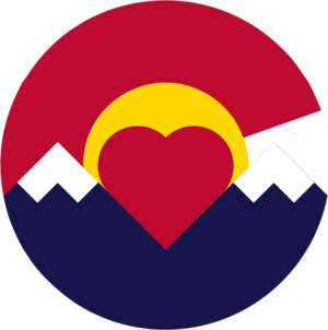 A circle with mountains and a heart in the middle