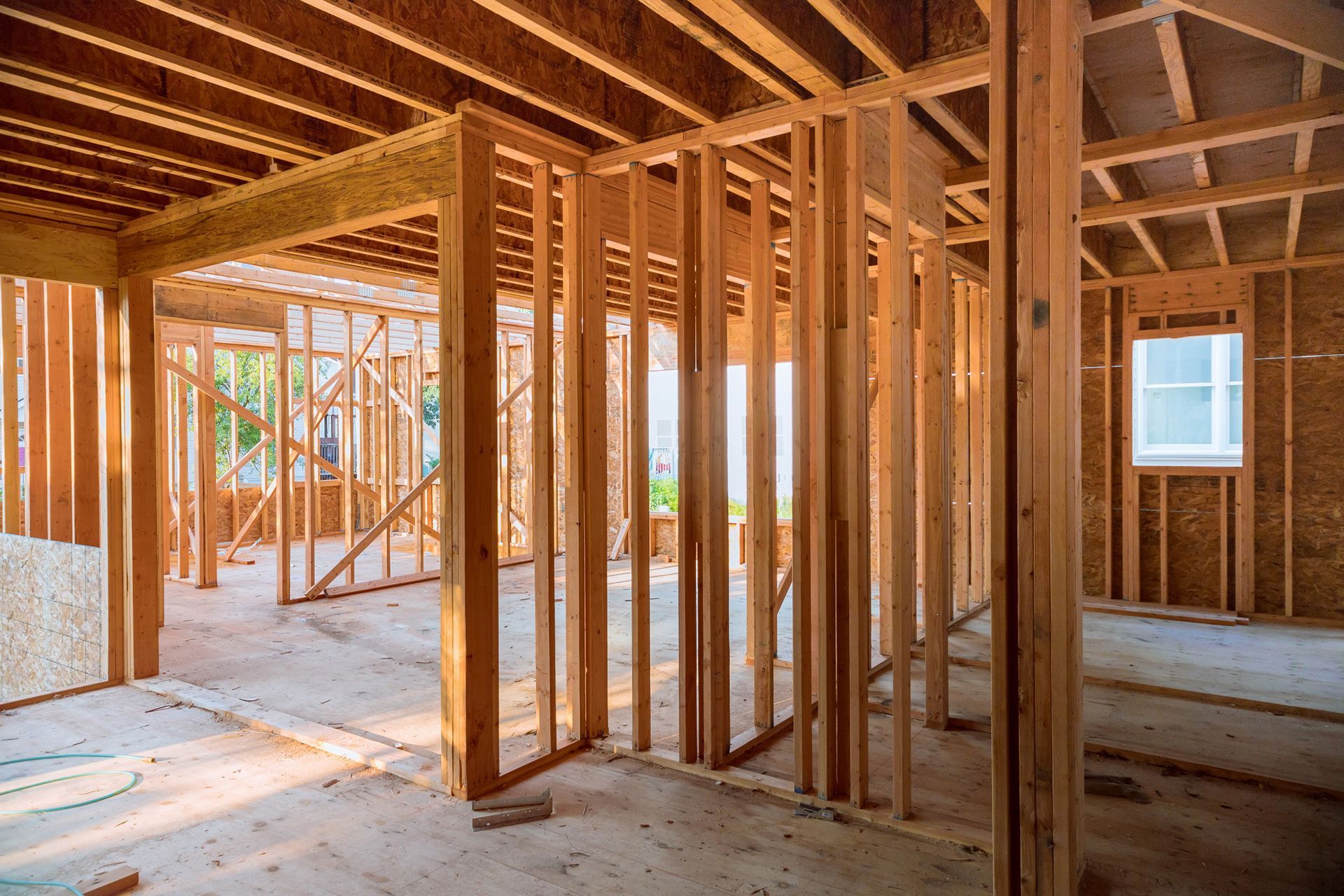 Inspector reviewing framing before drywall installation