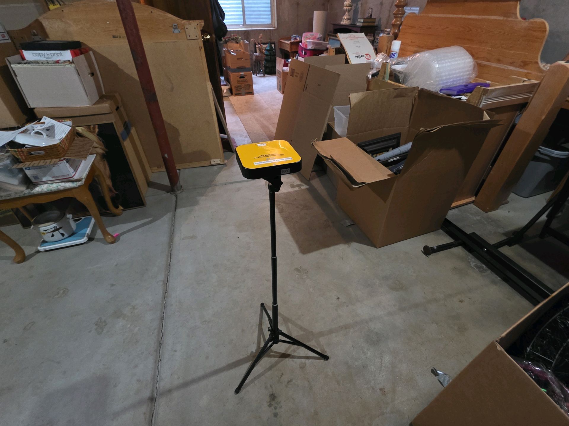 Radon mitigation with vent pipe and fan installed in a home