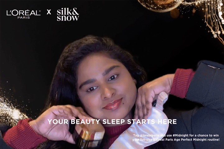 Woman holding sleep mask, promoting L'Oreal eye cream. Text: 