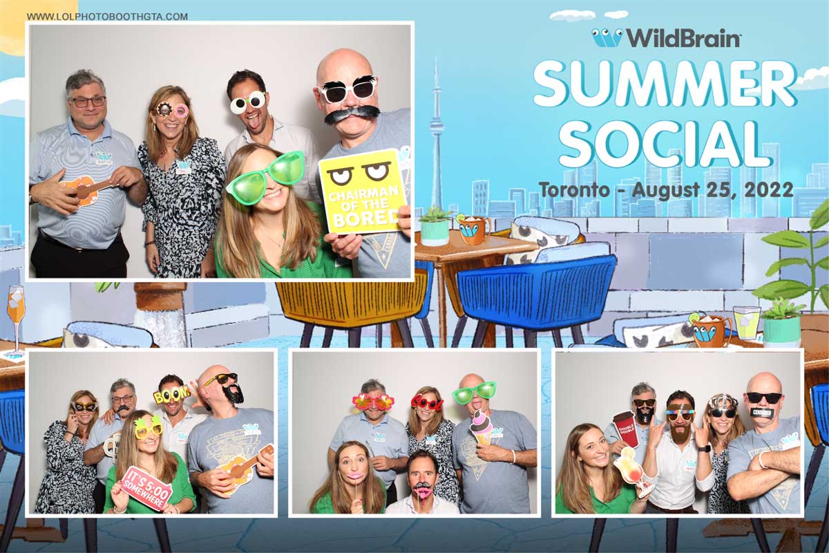 WildBrain Summer Social in Toronto. People in photo booth with props, and images of the city skyline.