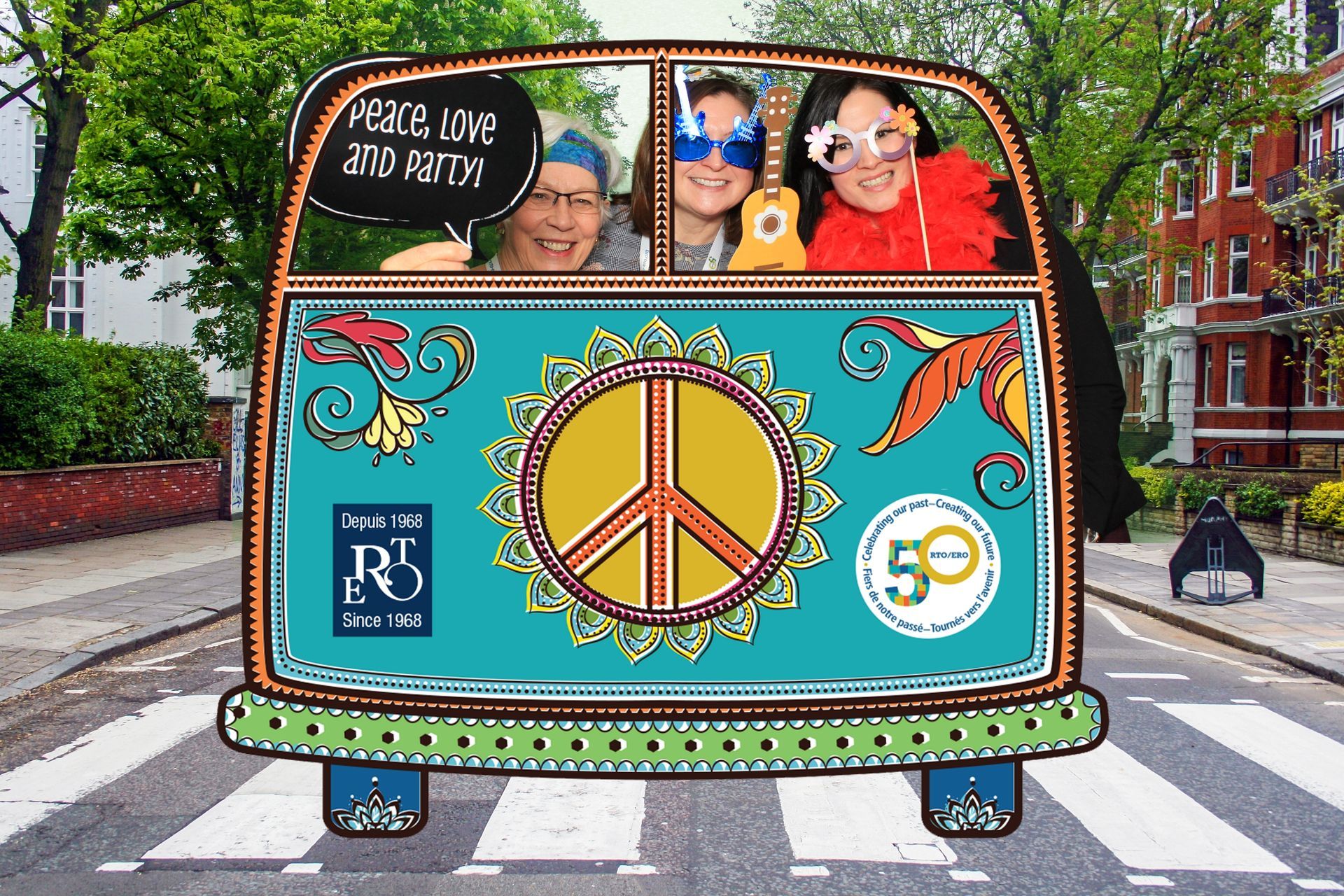 People in a decorated bus cutout on Abbey Road, holding props, with a peace sign.