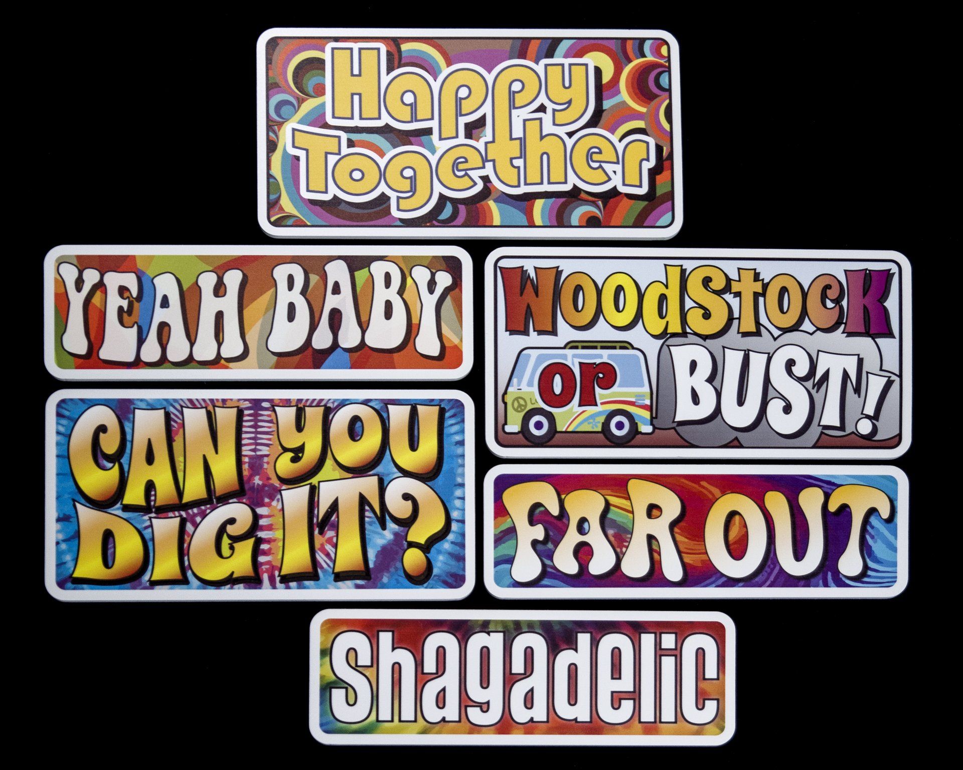 Seven psychedelic-style signs with phrases like 