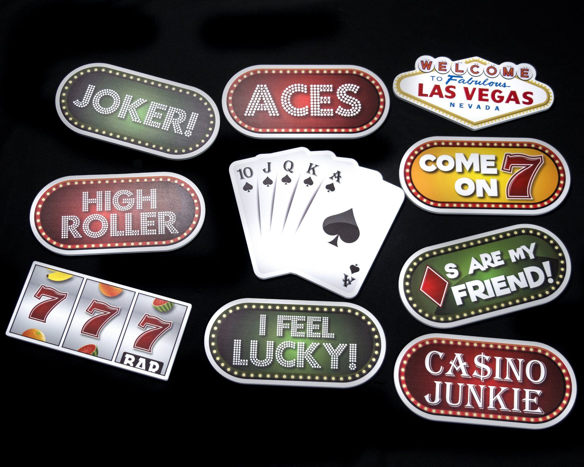 Casino-themed cutouts and playing cards on a black background, with phrases like 